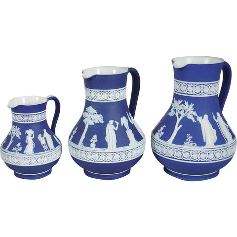 Set of Three English Wedgwood Dark Blue Jasperware Graduated Pitchers