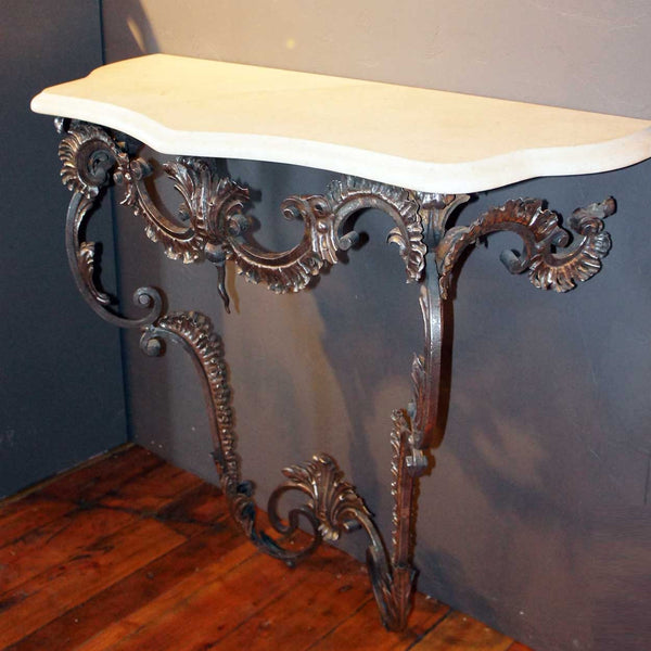 Pair of Italian Rococo Style Polished Steel Limestone Top Console Tables