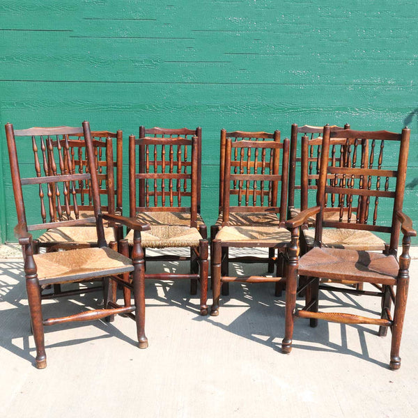 Harlequin Set of Ten English Yorkshire Oak and Elm Spindleback Rush Seat Dining Chairs