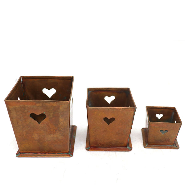 Set of Three American Arts and Crafts Graduated Hammered Copper Heart Boxes