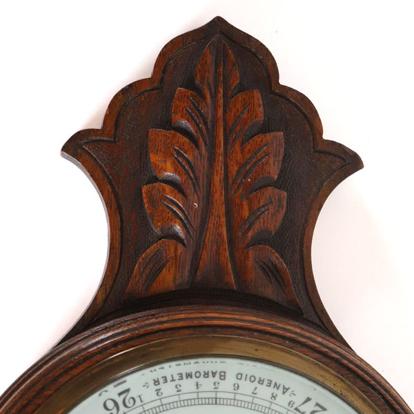 English Oak, Brass, Porcelain and Glass Aneroid Wheel Barometer