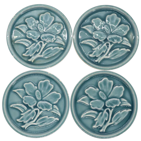 Set of Four American Blue Majolica Hibiscus Flower Round Stove Tiles