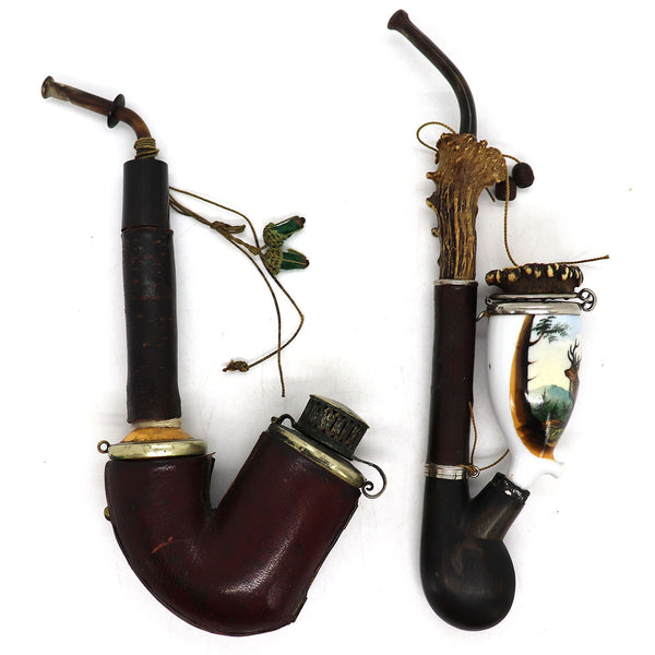 Two German Porcelain, Bone and Leather Pipes